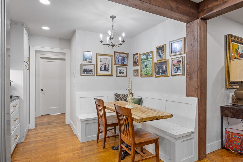 414 Ruth Street Kerrville, TX 78028 - Photo 8 of 19 a view of a dining room with furniture and chandelier