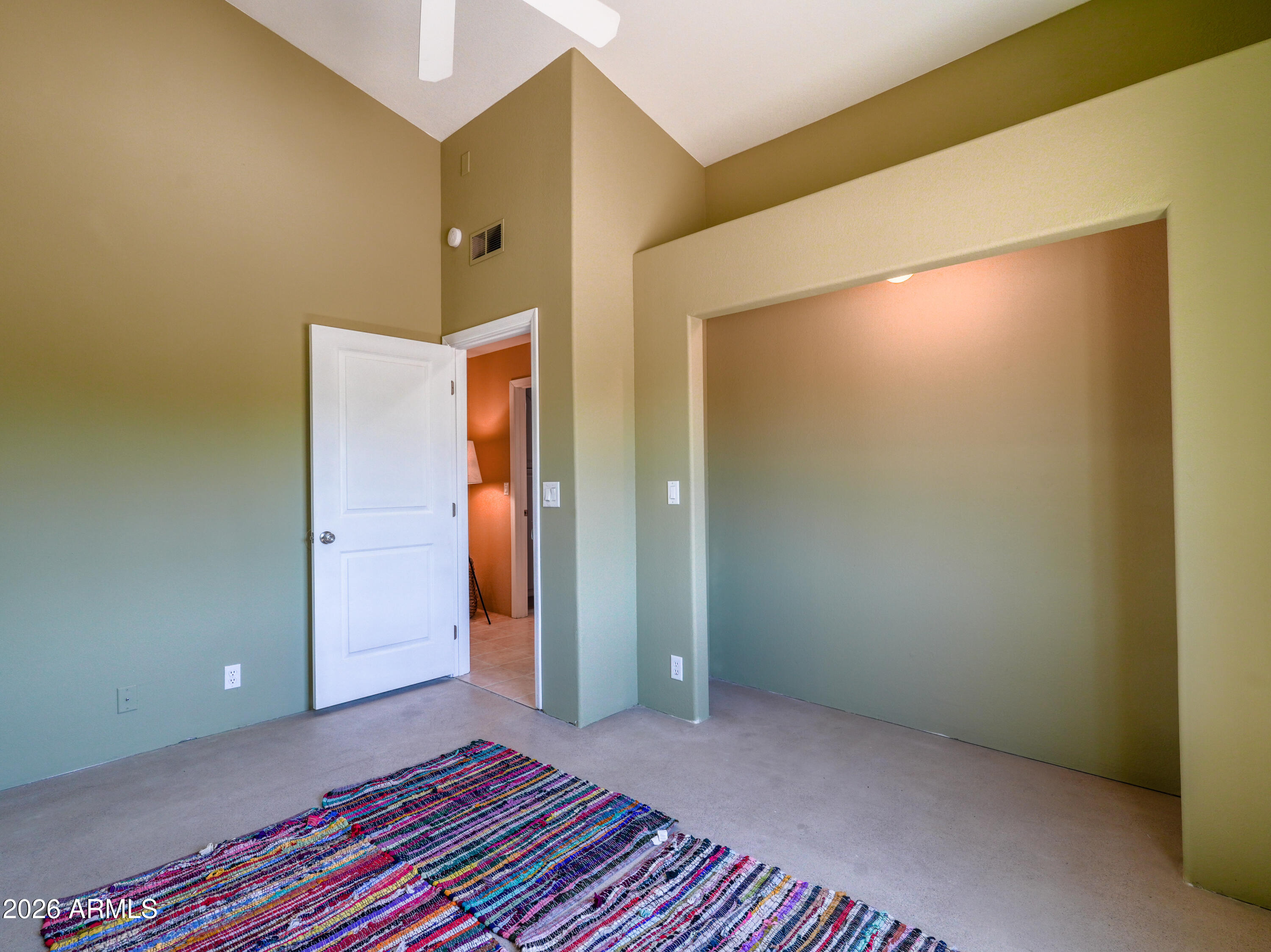 1224 North Acacia Road Apache Junction, AZ 85119 - Photo 31 of 48 an empty room with an entryway