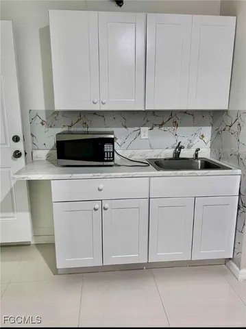 a view of a room with an empty space