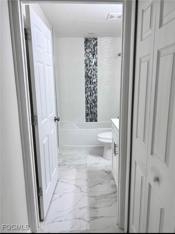 2209-2211 Park Road Lehigh Acres, FL 33971 - Photo 7 of 7 a bathroom with a glass door shower and a toilet