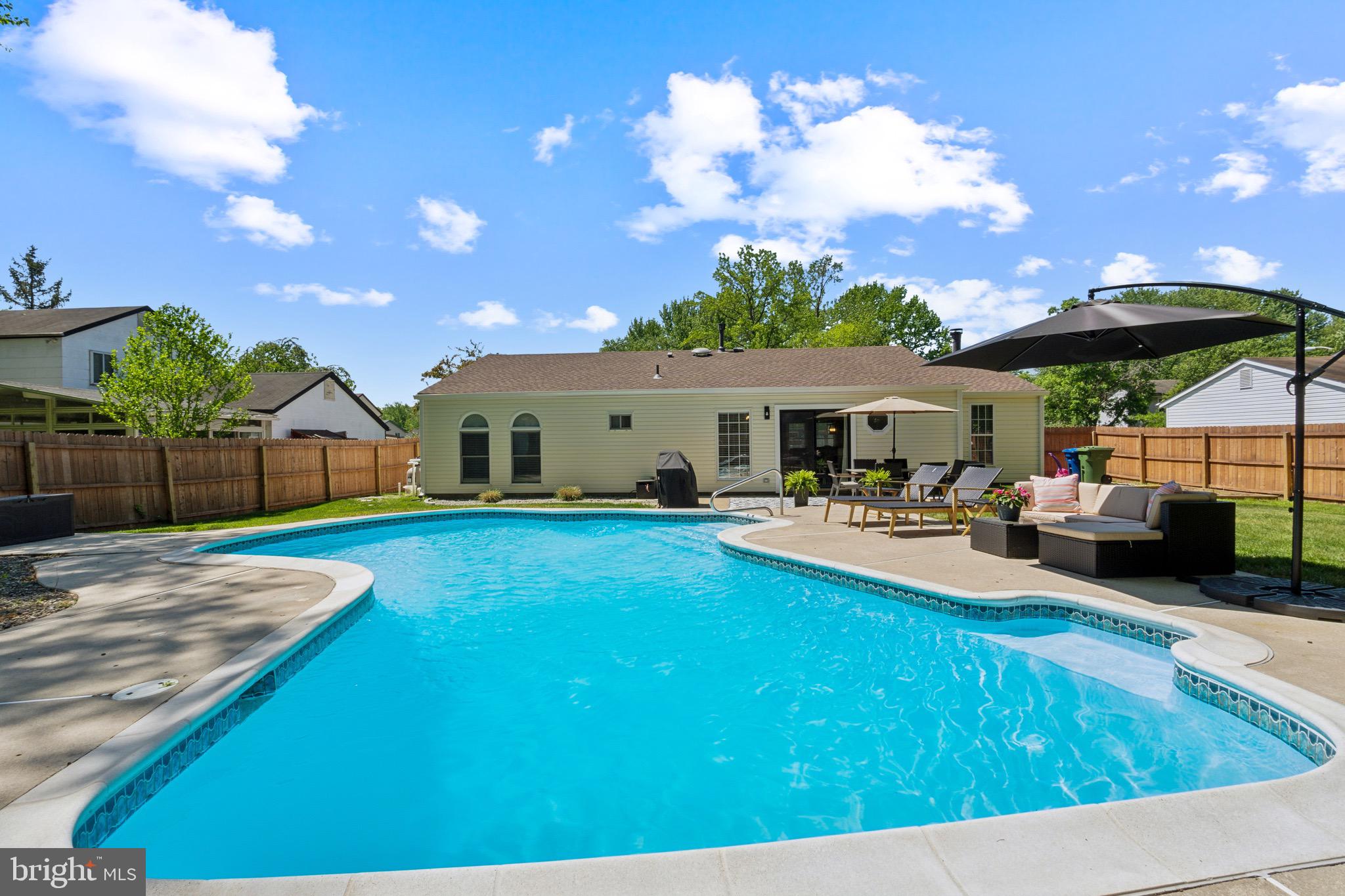 31 Hanover Road Marlton, NJ 08053 - Photo 15 of 15 a view of a house with backyard porch and sitting area