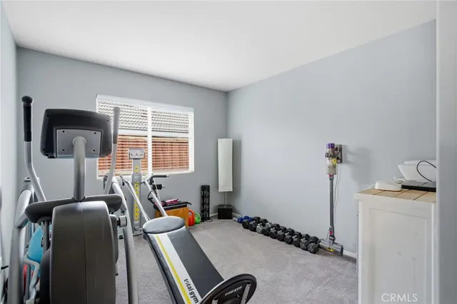 a room with furniture and a window