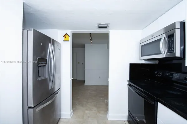 a balcony with trees in the background