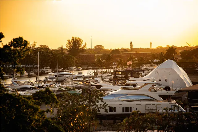 a view of a town with mountains in the background