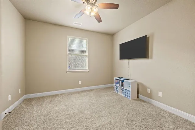 a livingroom with a flat screen tv