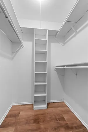 a view of an empty walk in closet