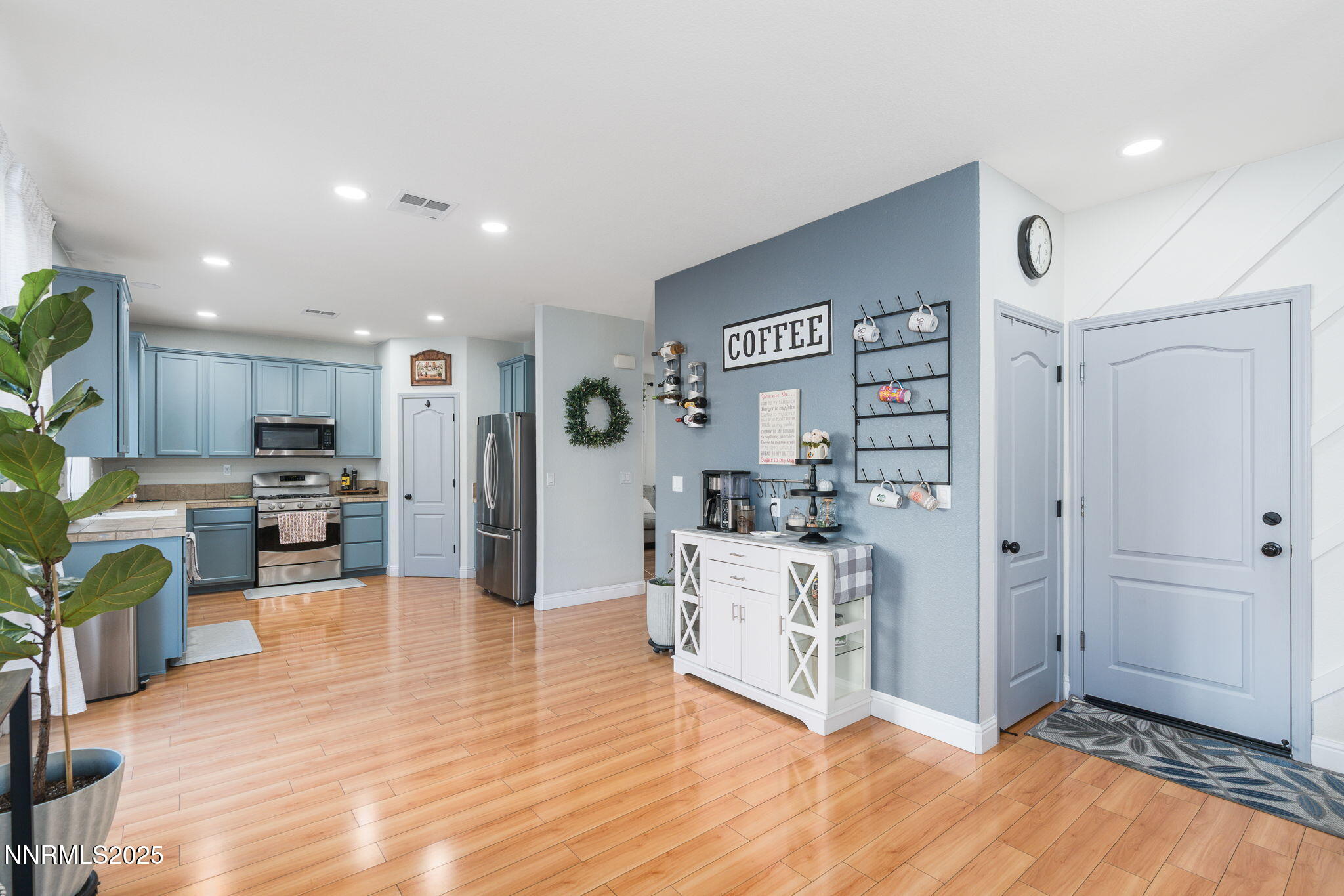 7220 Windswept Loop Sparks, NV 89436 - Photo 15 of 35 a view of kitchen with furniture and wooden floor
