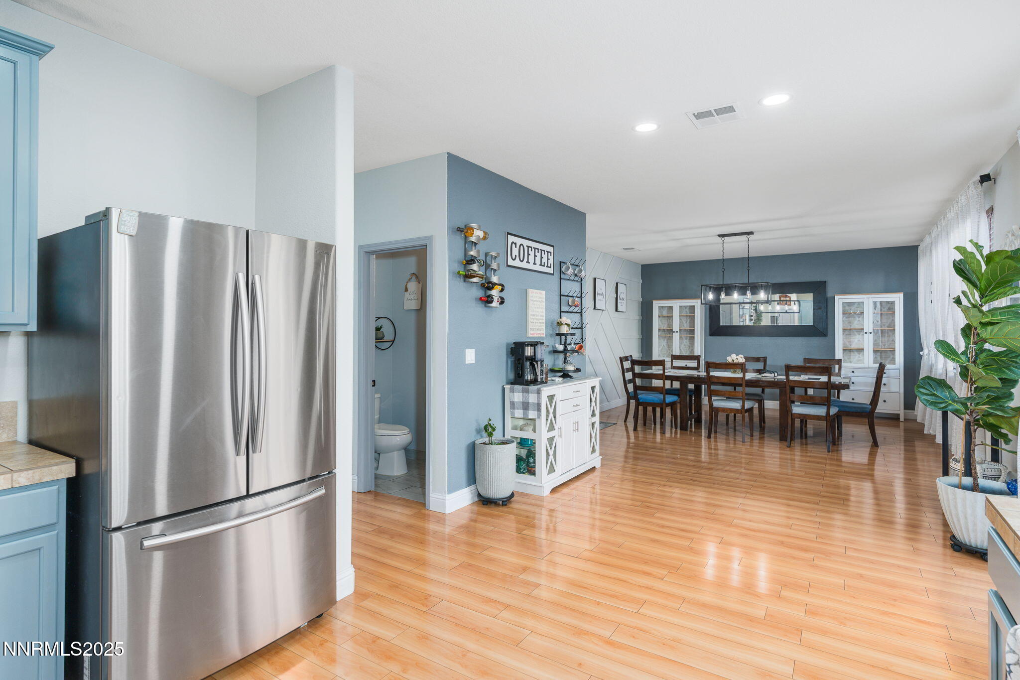 7220 Windswept Loop Sparks, NV 89436 - Photo 16 of 35 a kitchen with stainless steel appliances granite countertop a refrigerator and a stove top oven