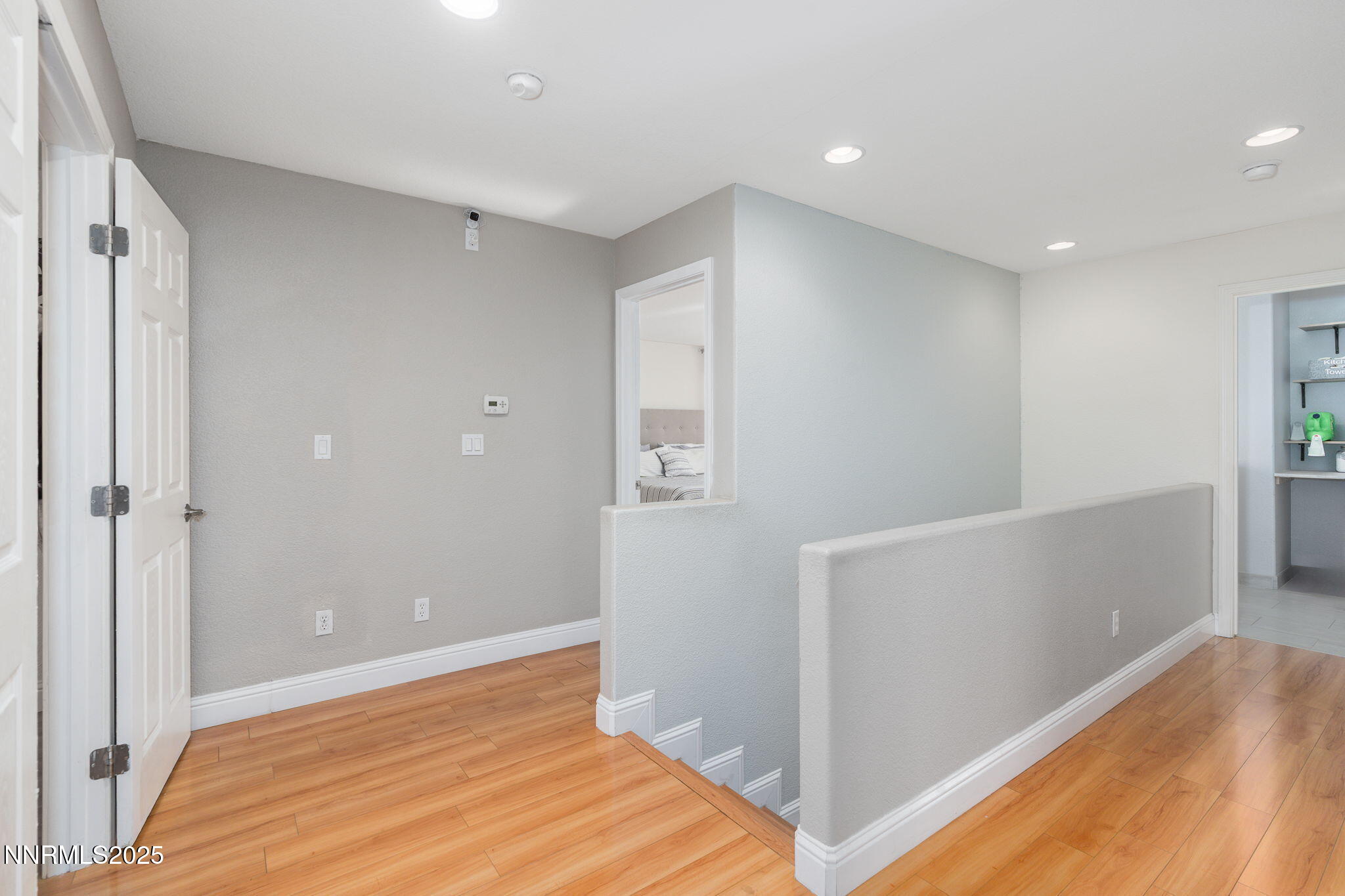 7220 Windswept Loop Sparks, NV 89436 - Photo 19 of 35 a view of hallway with wooden floor