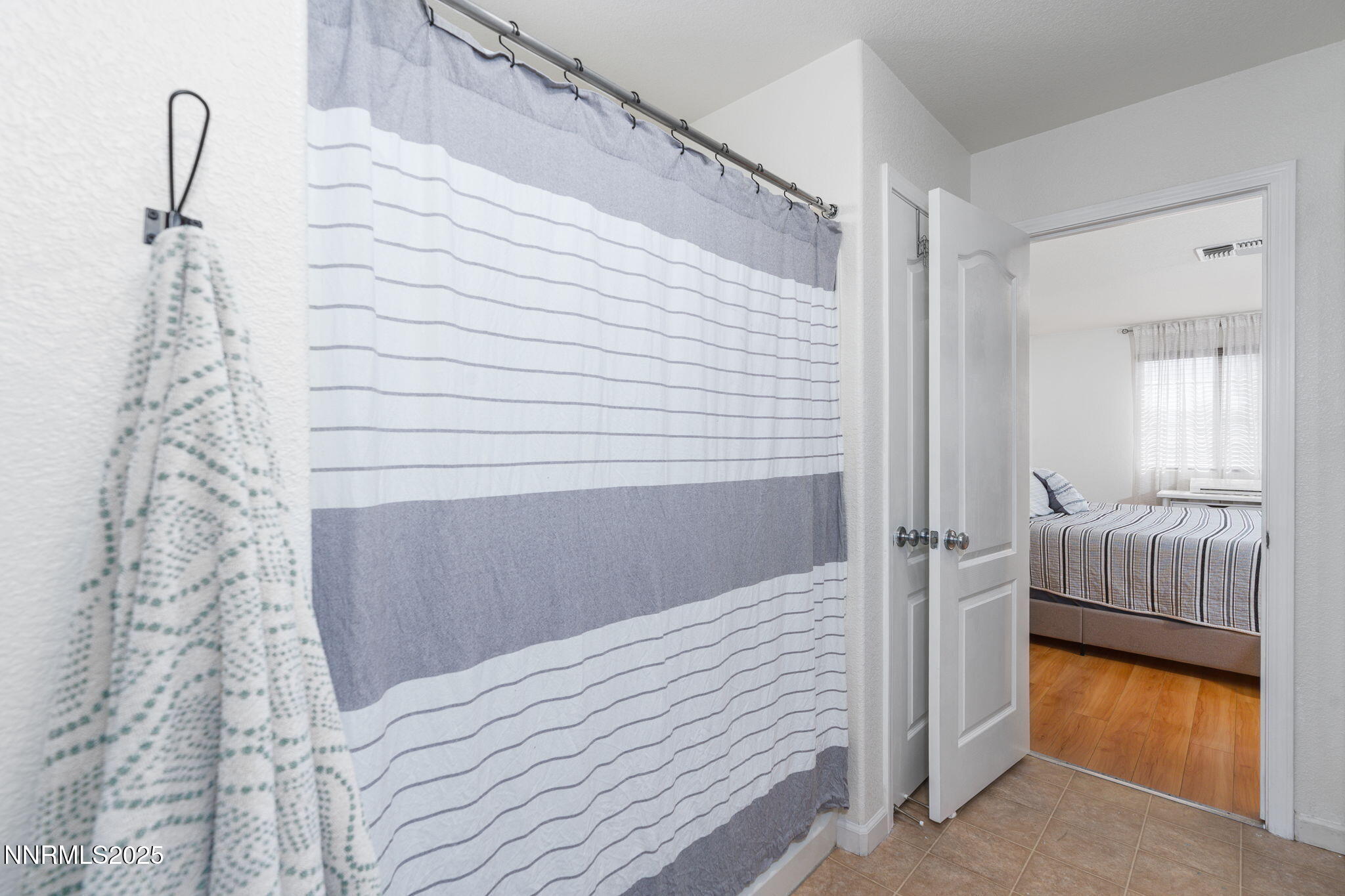 7220 Windswept Loop Sparks, NV 89436 - Photo 26 of 35 a bathroom with a sink and a mirror