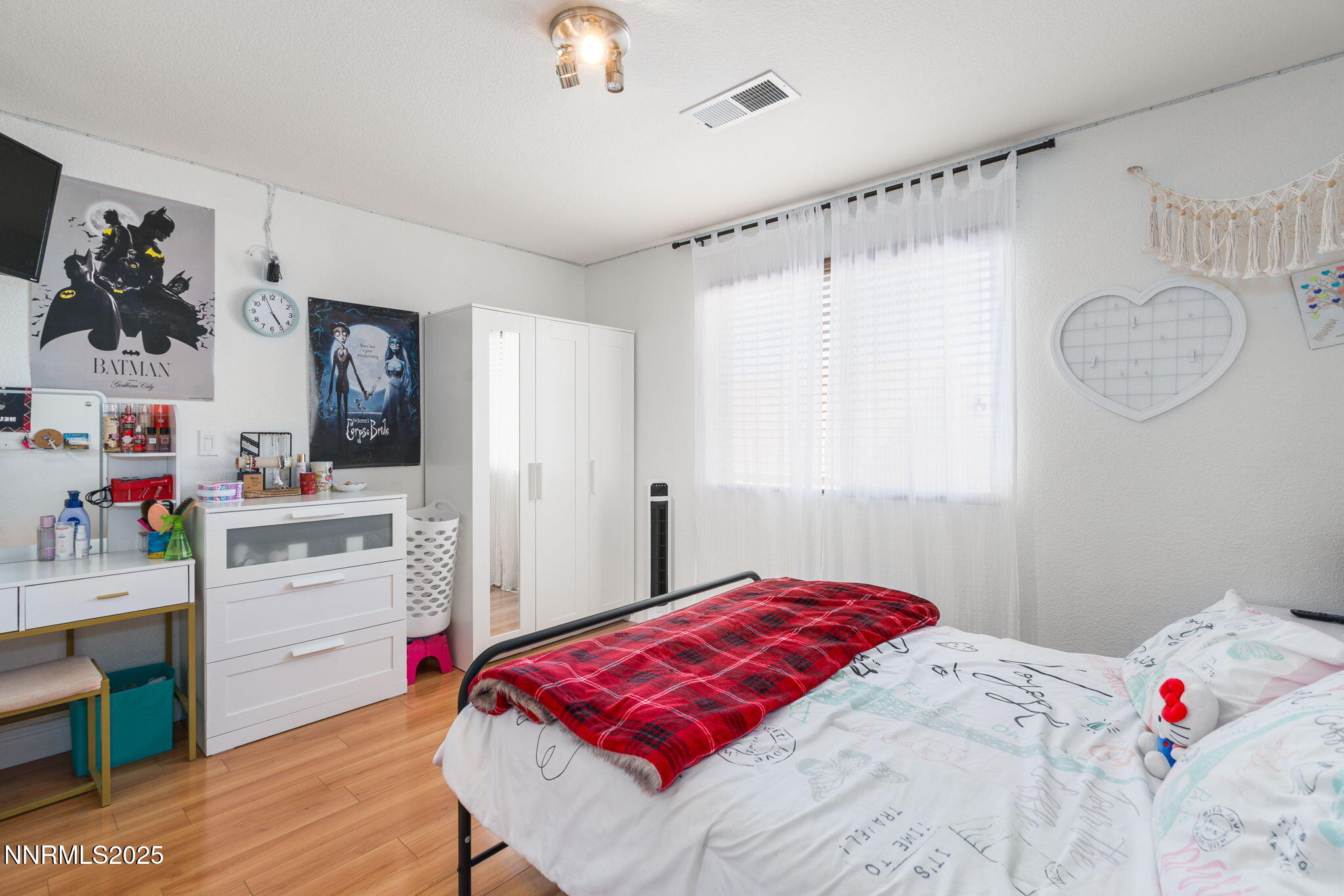 7220 Windswept Loop Sparks, NV 89436 - Photo 28 of 35 a bedroom with a bed and a white cabinets