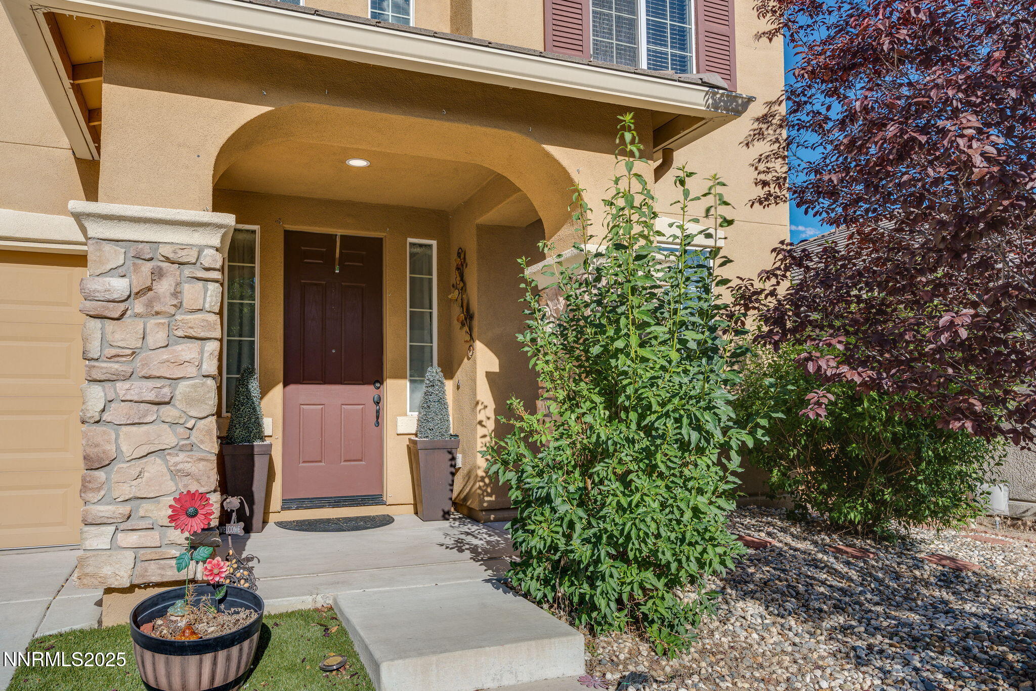 7220 Windswept Loop Sparks, NV 89436 - Photo 3 of 35 a front view of house with yard