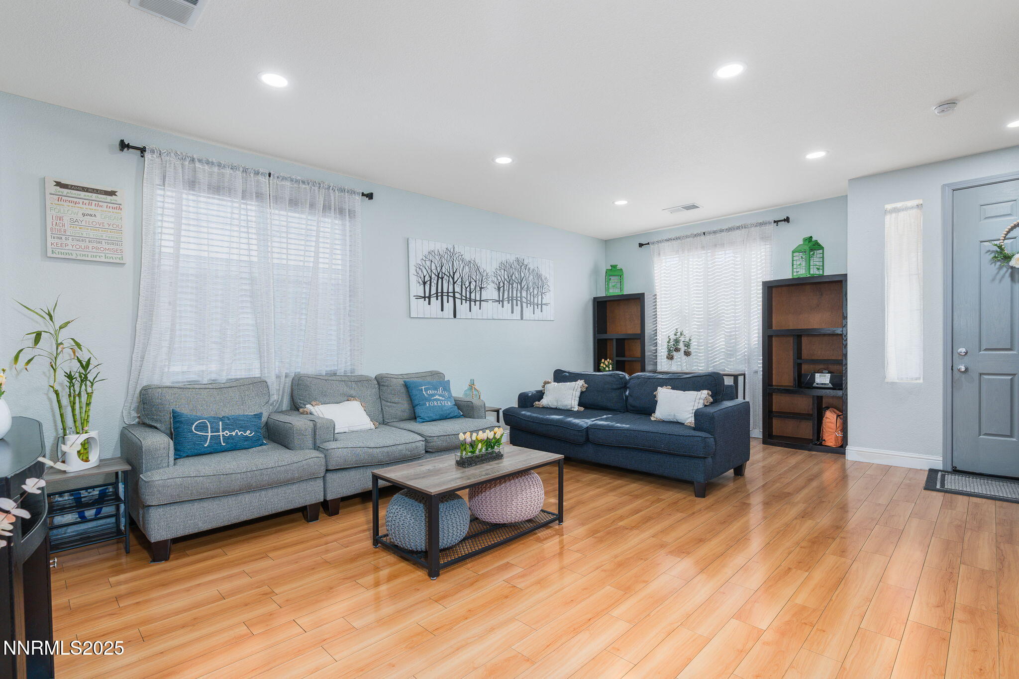 7220 Windswept Loop Sparks, NV 89436 - Photo 4 of 35 a living room with furniture and a wooden floor