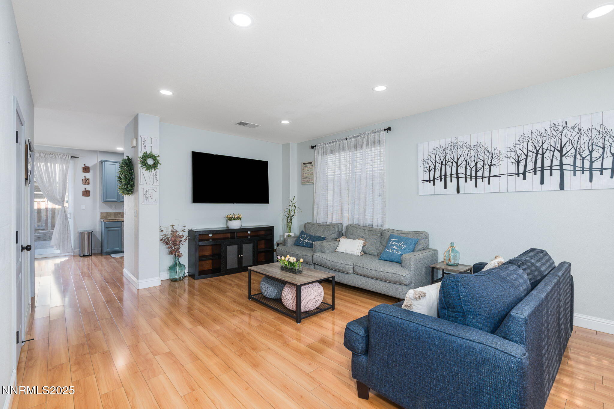7220 Windswept Loop Sparks, NV 89436 - Photo 5 of 35 a living room with furniture and a flat screen tv