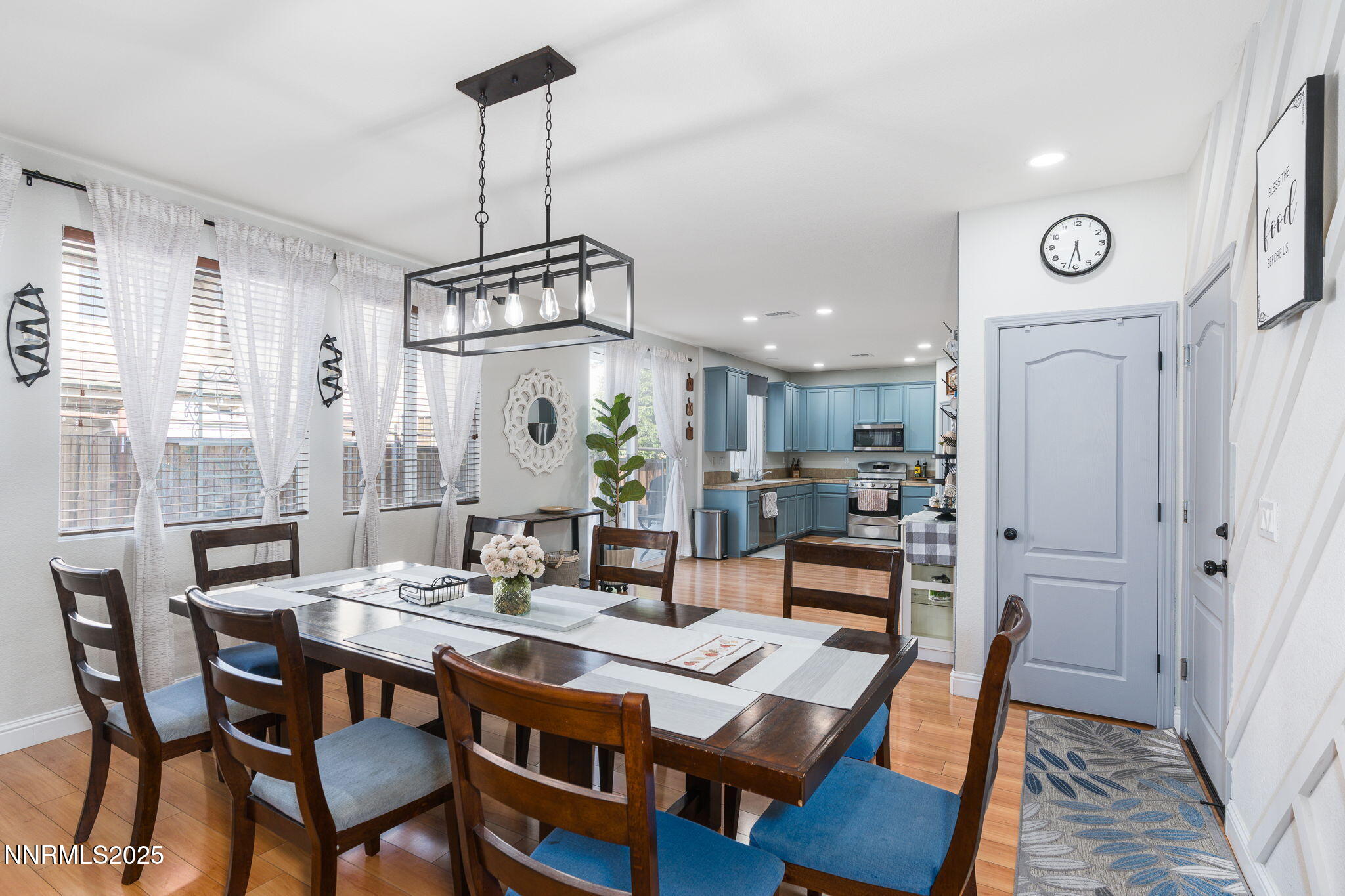 7220 Windswept Loop Sparks, NV 89436 - Photo 7 of 35 a view of a dining room with furniture window and wooden floor