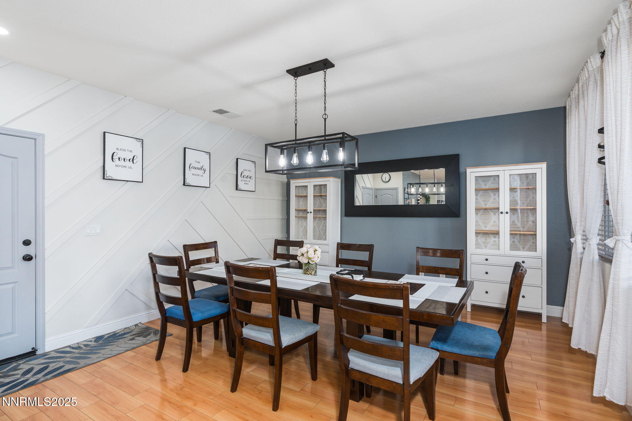 7220 Windswept Loop Sparks, NV 89436 - Photo 9 of 35 a view of a dining room with furniture window and wooden floor