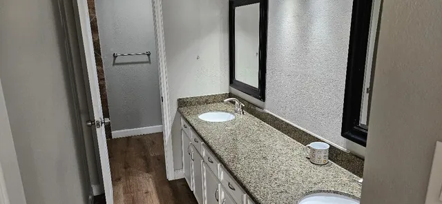 a view of empty room with windows