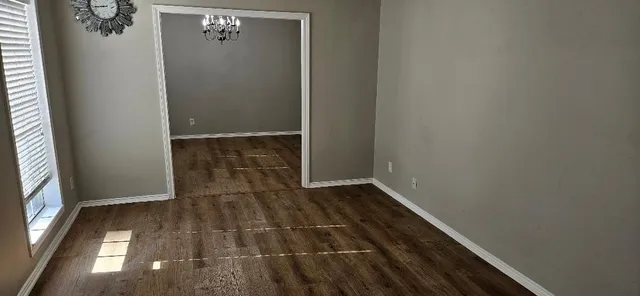 a view of a small space with racks on the wall