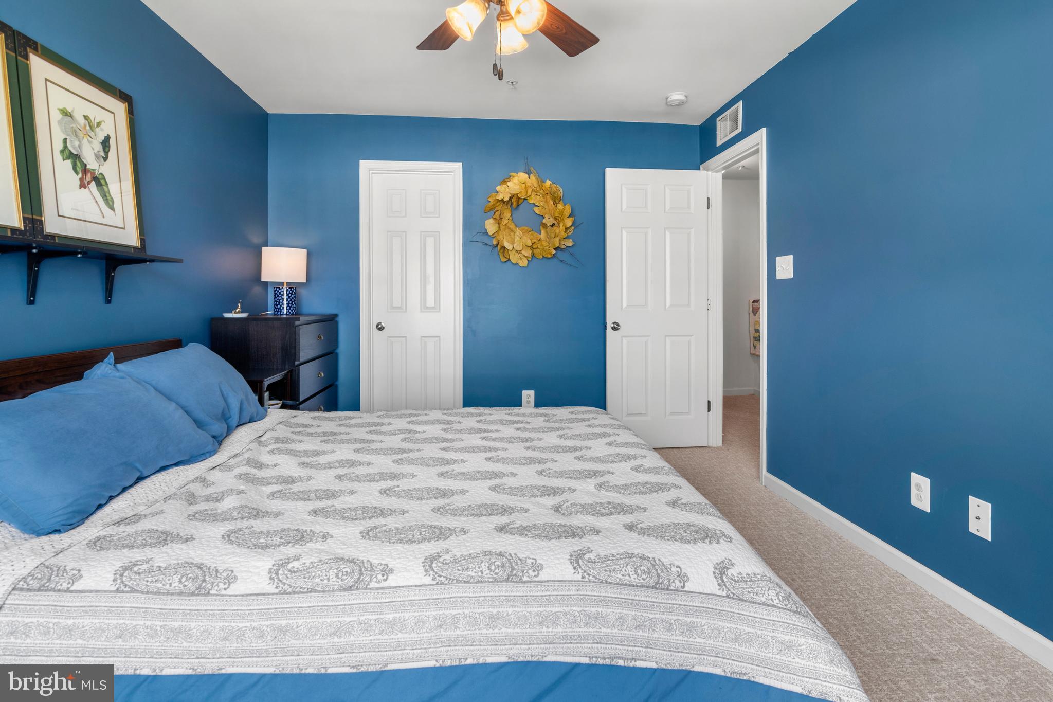 1342 Millar Road Aberdeen, MD 21001 - Photo 21 of 34 a bedroom with a bed and a chandelier