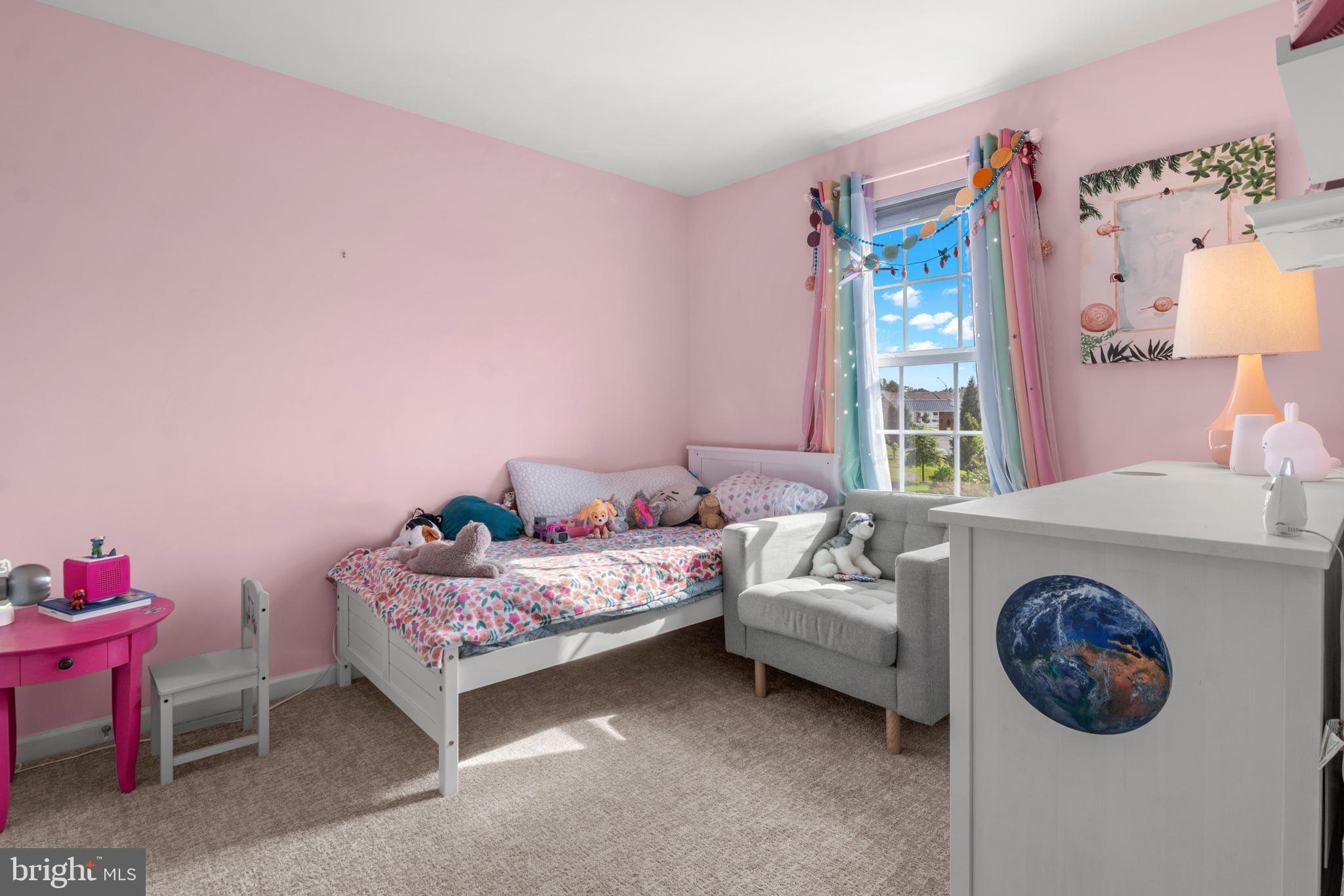 1342 Millar Road Aberdeen, MD 21001 - Photo 23 of 34 a bedroom with a bed and a chair