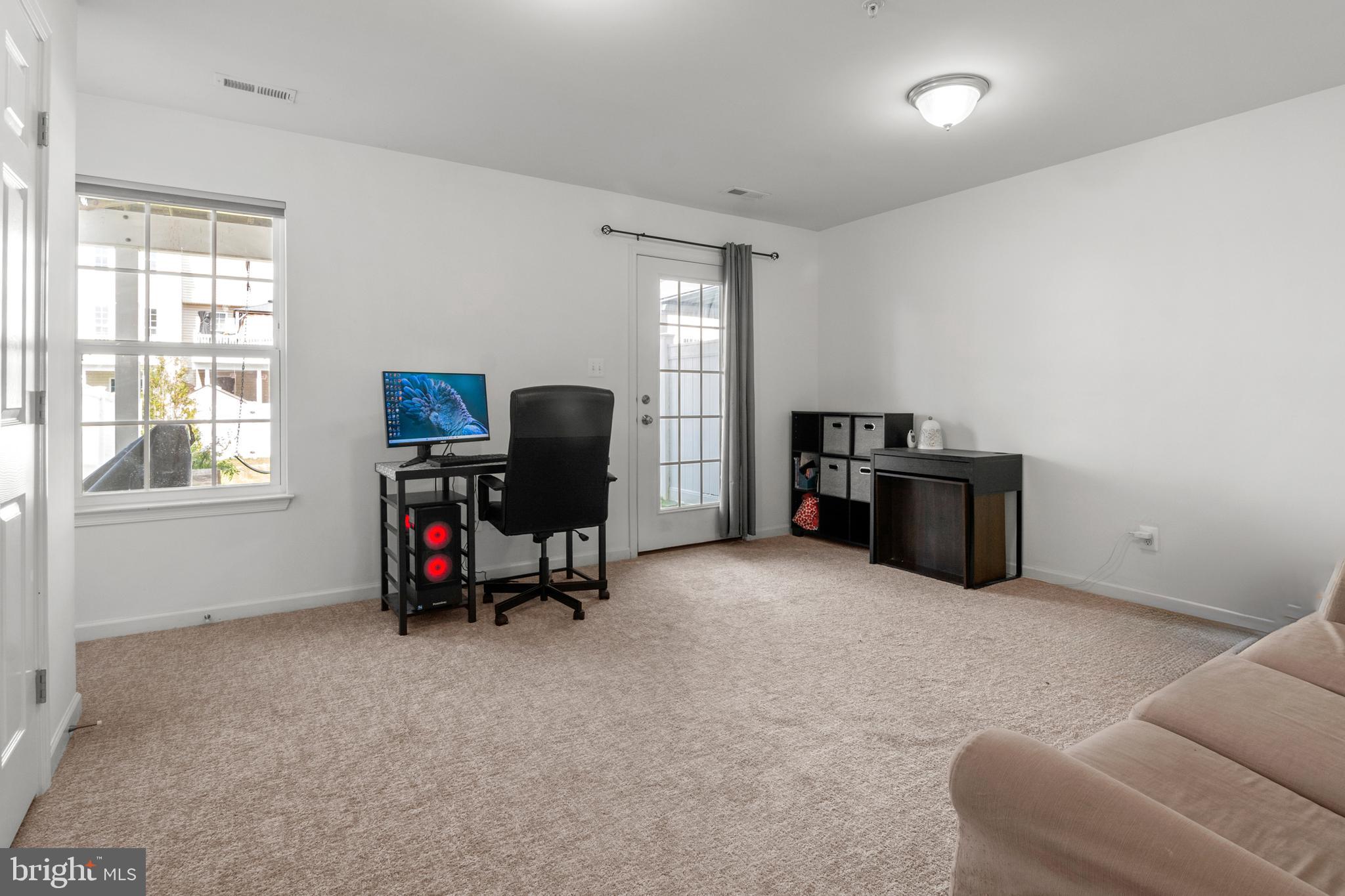 1342 Millar Road Aberdeen, MD 21001 - Photo 30 of 34 a view of a workspace with furniture and a window