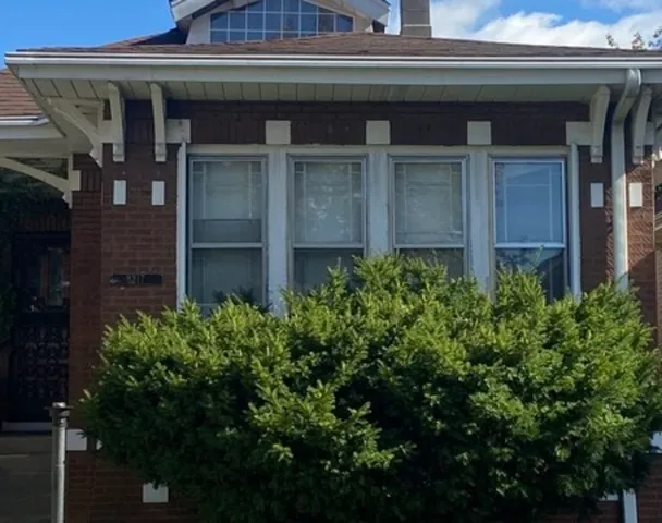 front view of a house with a small space