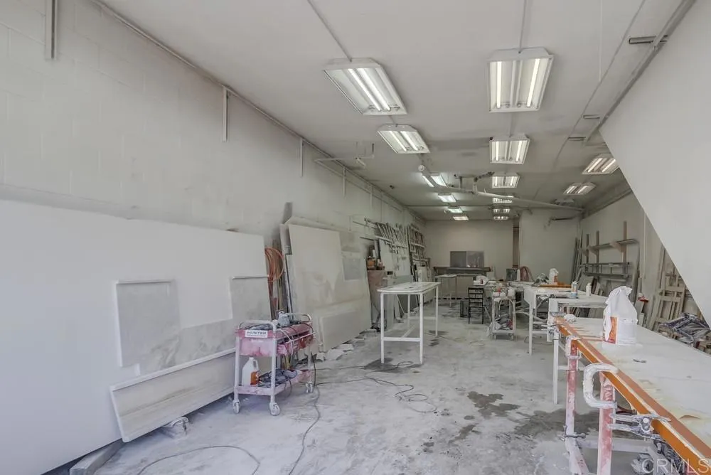 734 Grand Avenue Spring Valley, CA 91977 - Photo 8 of 33 a view of a room with lots of chairs and chandelier