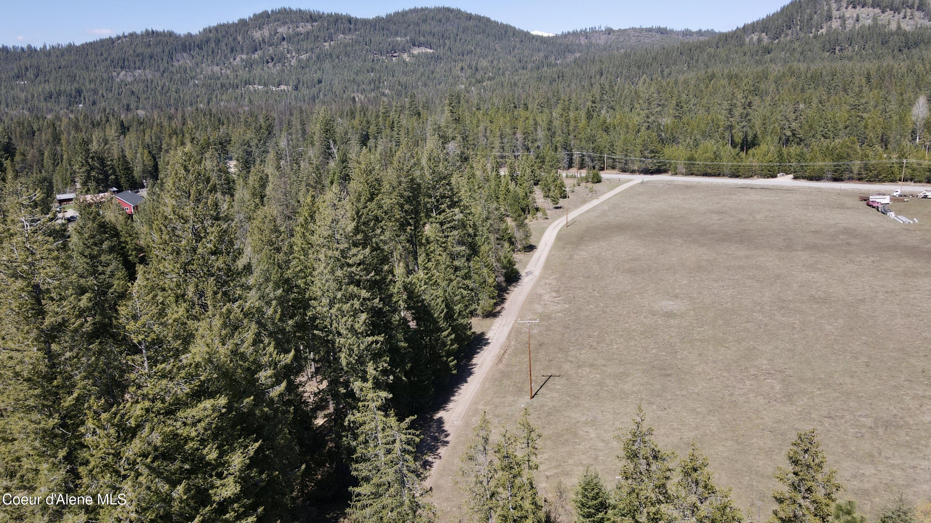3216 Dufort Road Sagle, ID 83860 - Photo 29 of 99 Aerial front pasture and woods 2