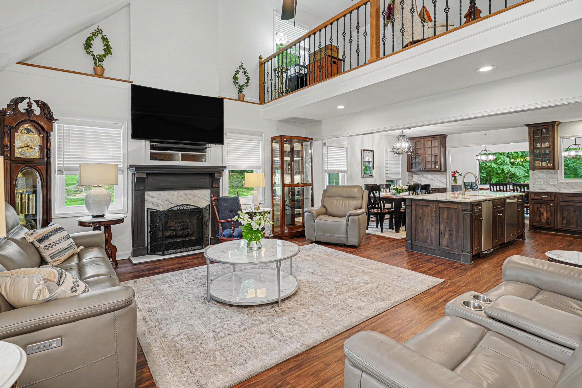 5833 Highway 76 East Springfield, TN 37172 - Photo 14 of 66 a living room with furniture a fireplace and a flat screen tv