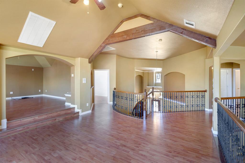 9618 Peach Tree Lane Rowlett, TX 75089 - Photo 30 of 40 a view of gallery with wooden floor
