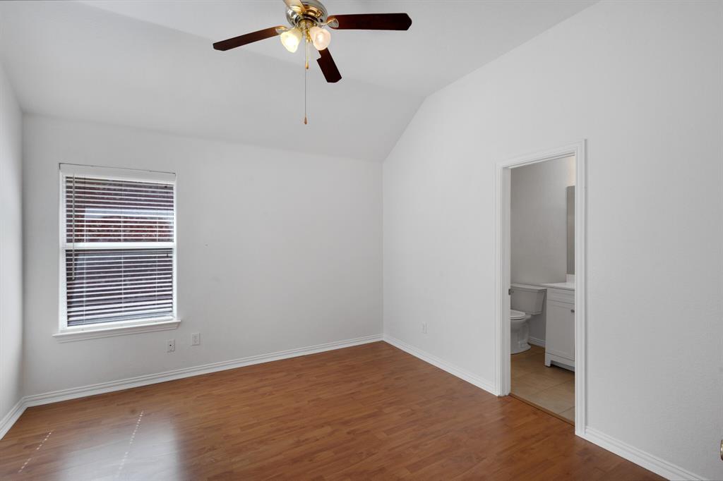 9618 Peach Tree Lane Rowlett, TX 75089 - Photo 34 of 40 an empty room with a window