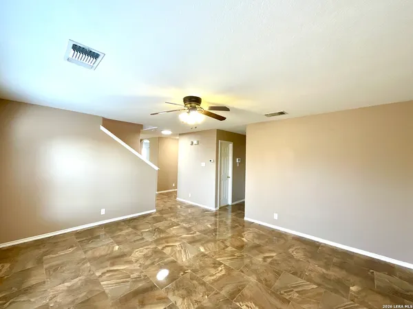 a view of an empty room and window