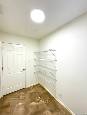 a bathroom with a toilet and a sink