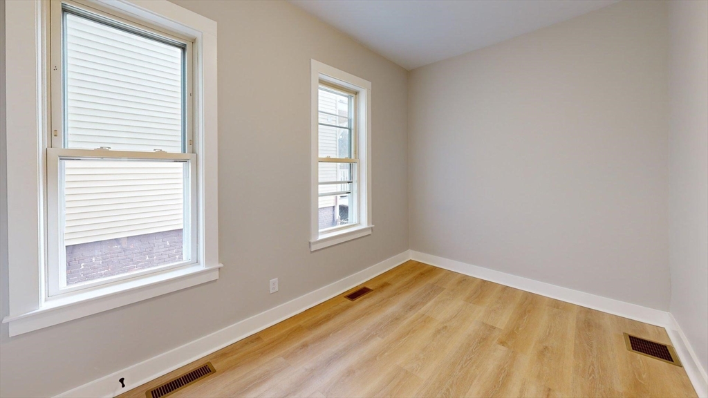 273 Maverick Street, Unit 7 Boston, MA 02128 - Photo 19 of 26 a view of a room that has a window in it