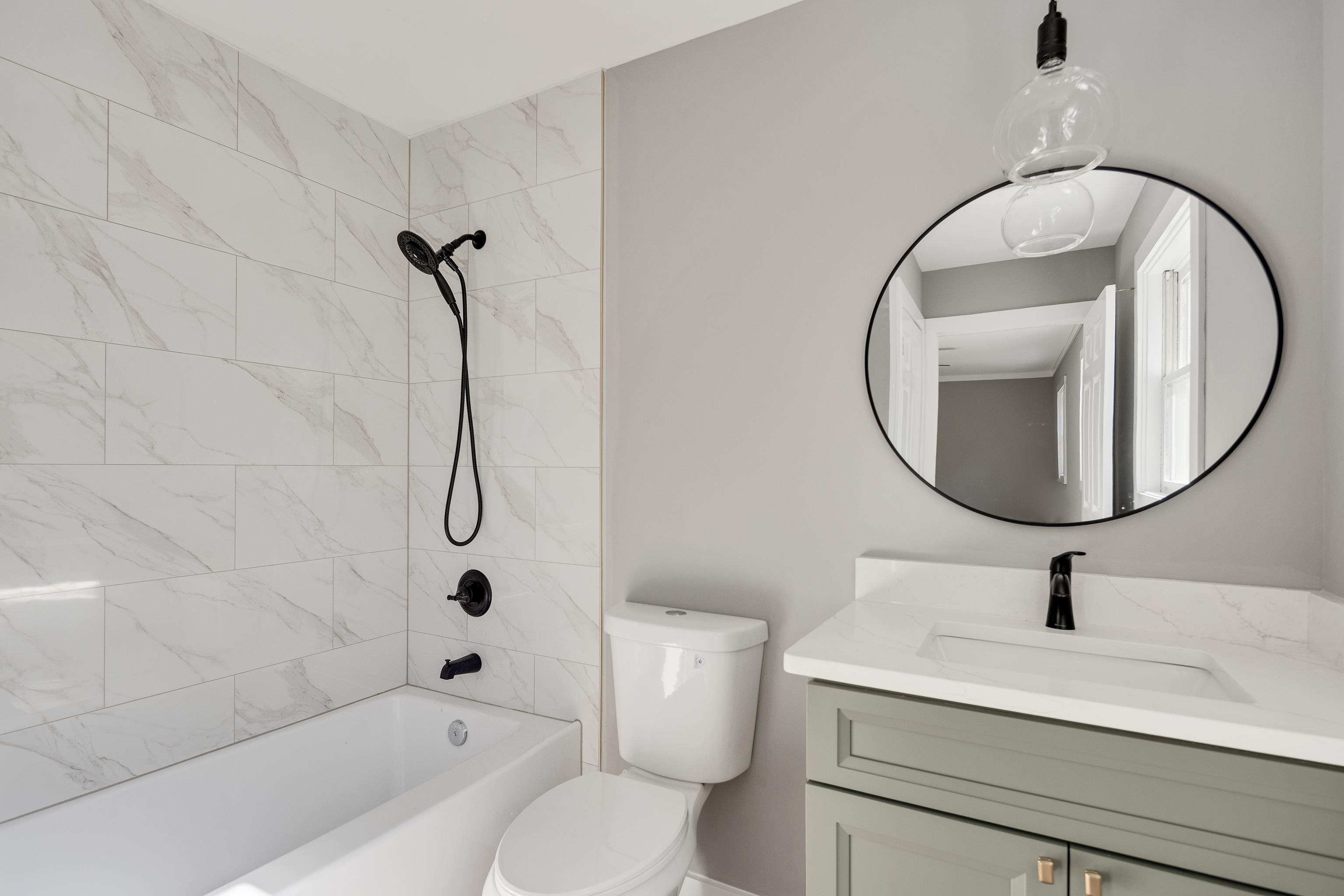 6380 Kirby Ridge Cove Memphis, TN 38119 - Photo 24 of 40 Bathroom with shower / washtub combination and vanity