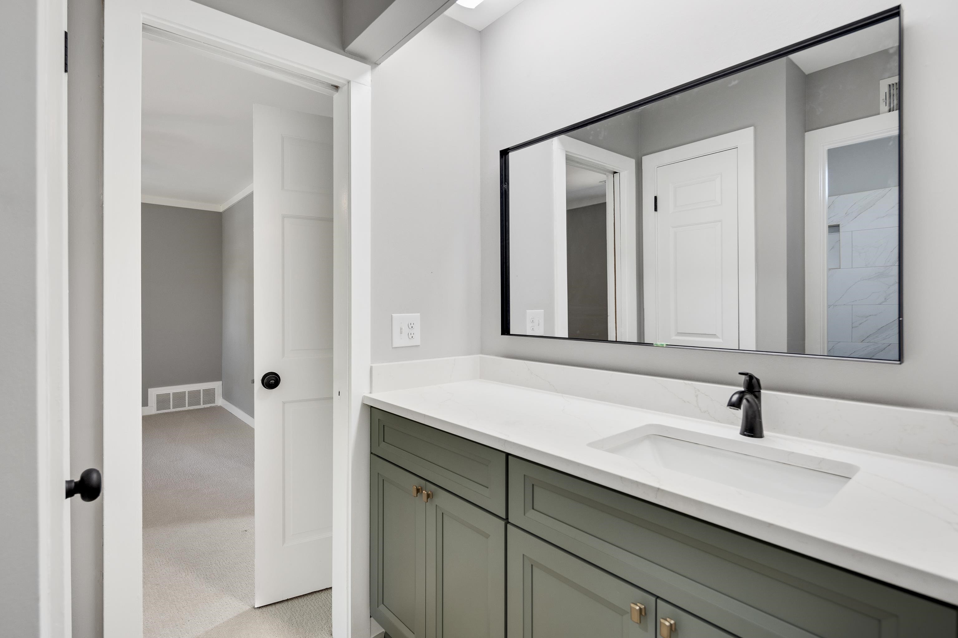 6380 Kirby Ridge Cove Memphis, TN 38119 - Photo 26 of 40 Bathroom featuring light carpet and vanity