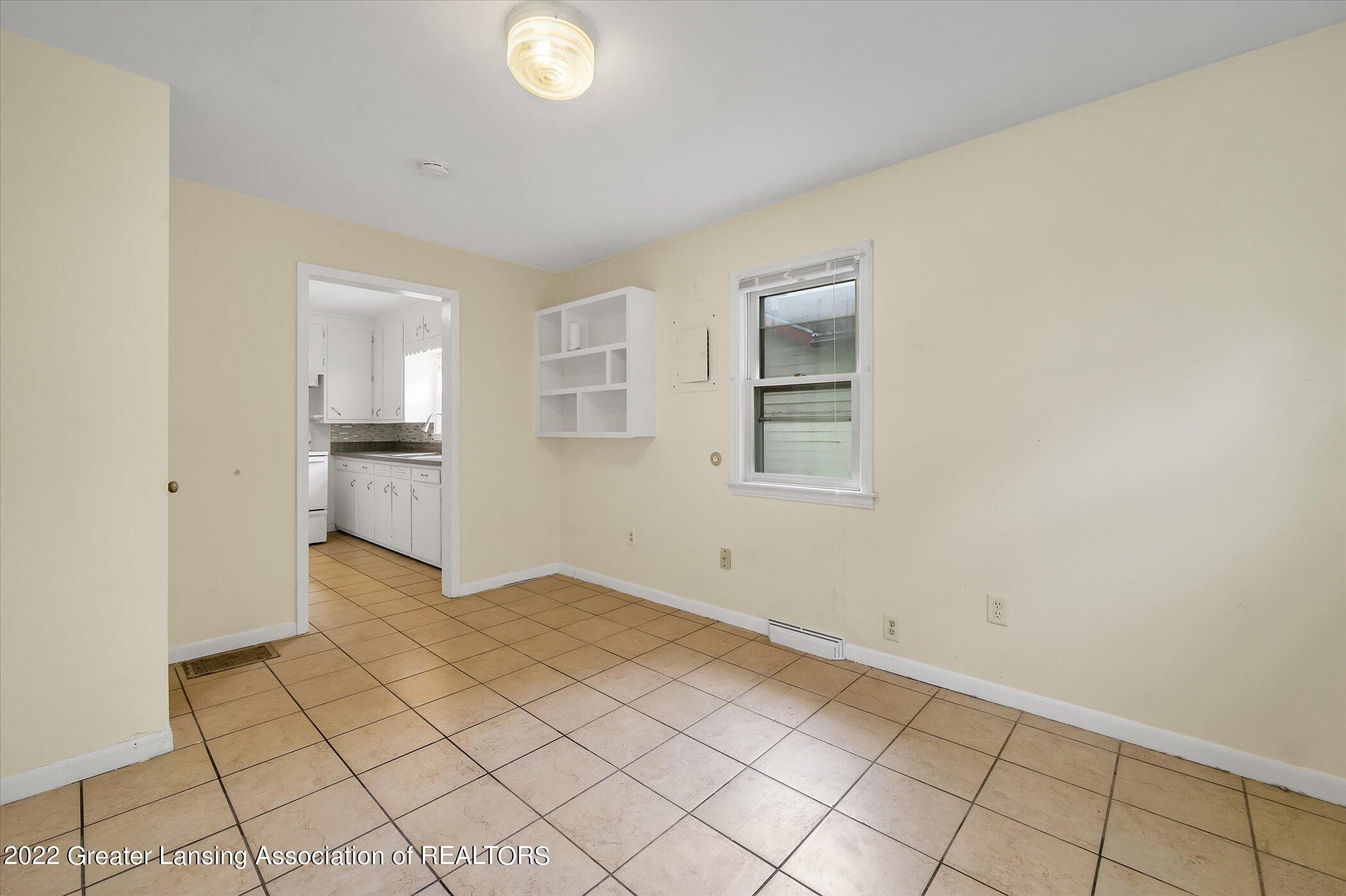 707 West Holmes Road Lansing, MI 48910 - Photo 19 of 23 12-707-W-Holmes-Rd-WindowStill-Real-Esta