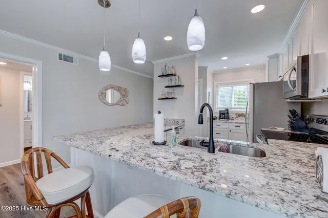 $479,900 | 400 Virginia Avenue, Unit 101B, Carolina Beach, NC 28428