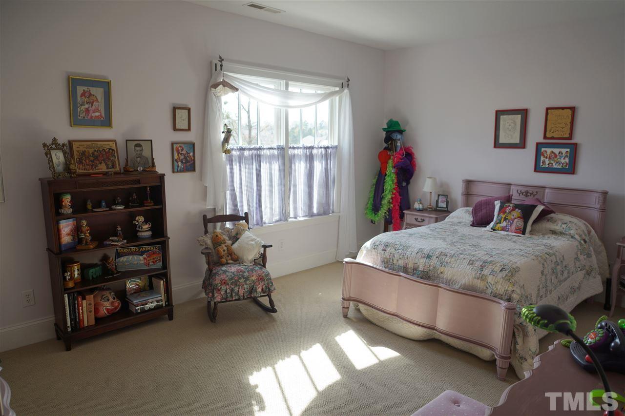 607 Competition Road Raleigh, NC 27603 - Photo 19 of 20 Other upstairs bedroom, also with WIC, and direct entry to bathroom