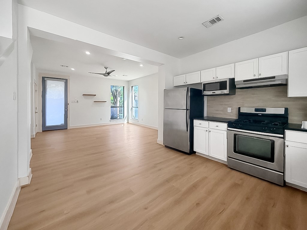 4120 Valley View Road, Unit A Austin, TX 78704 - Photo 3 of 16 Seamless flow between the kitchen and living areas defines this open-concept layout