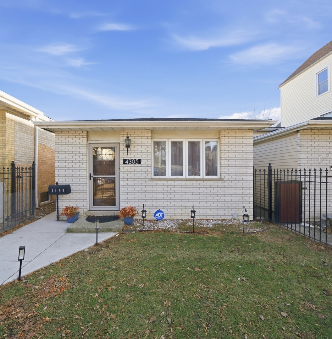 a view of a patio with table and chairs a barbeque