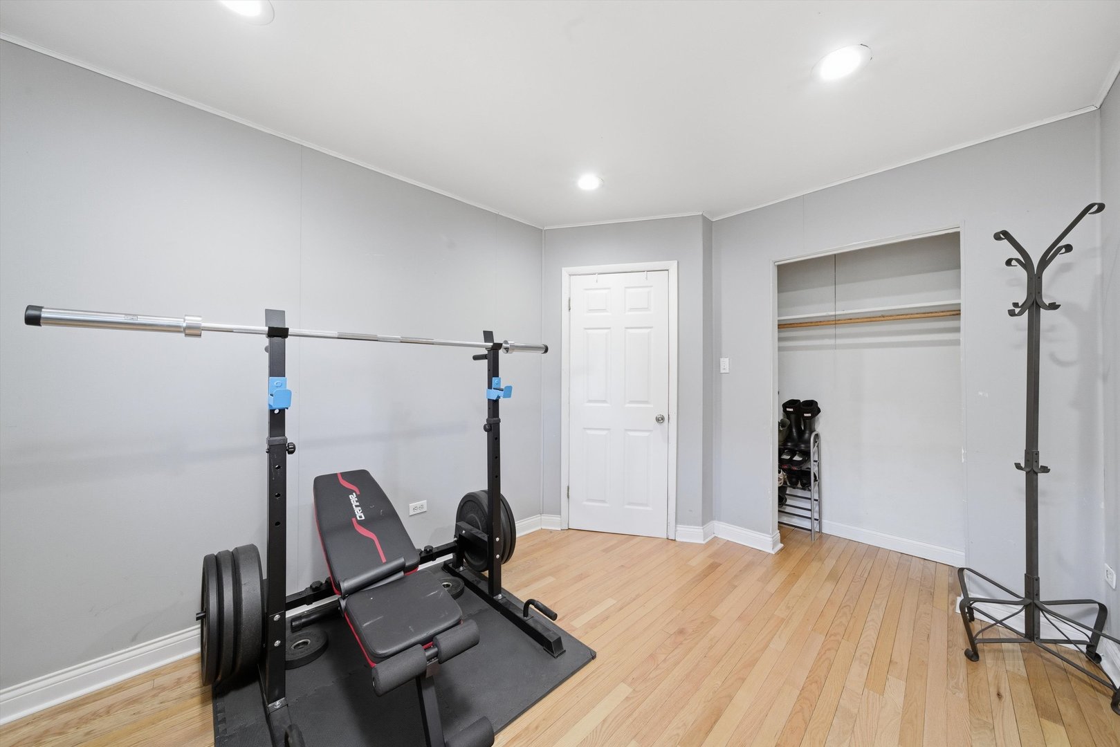 4305 South Wood Street Chicago, IL 60609 - Photo 11 of 22 a room with a bed and wooden floor