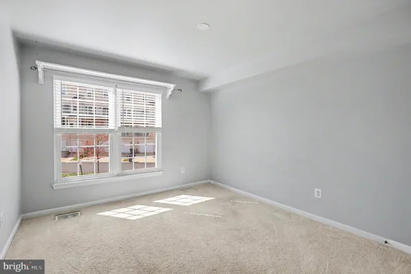 an empty room with a window