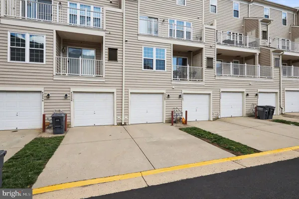a front view of a house with yard