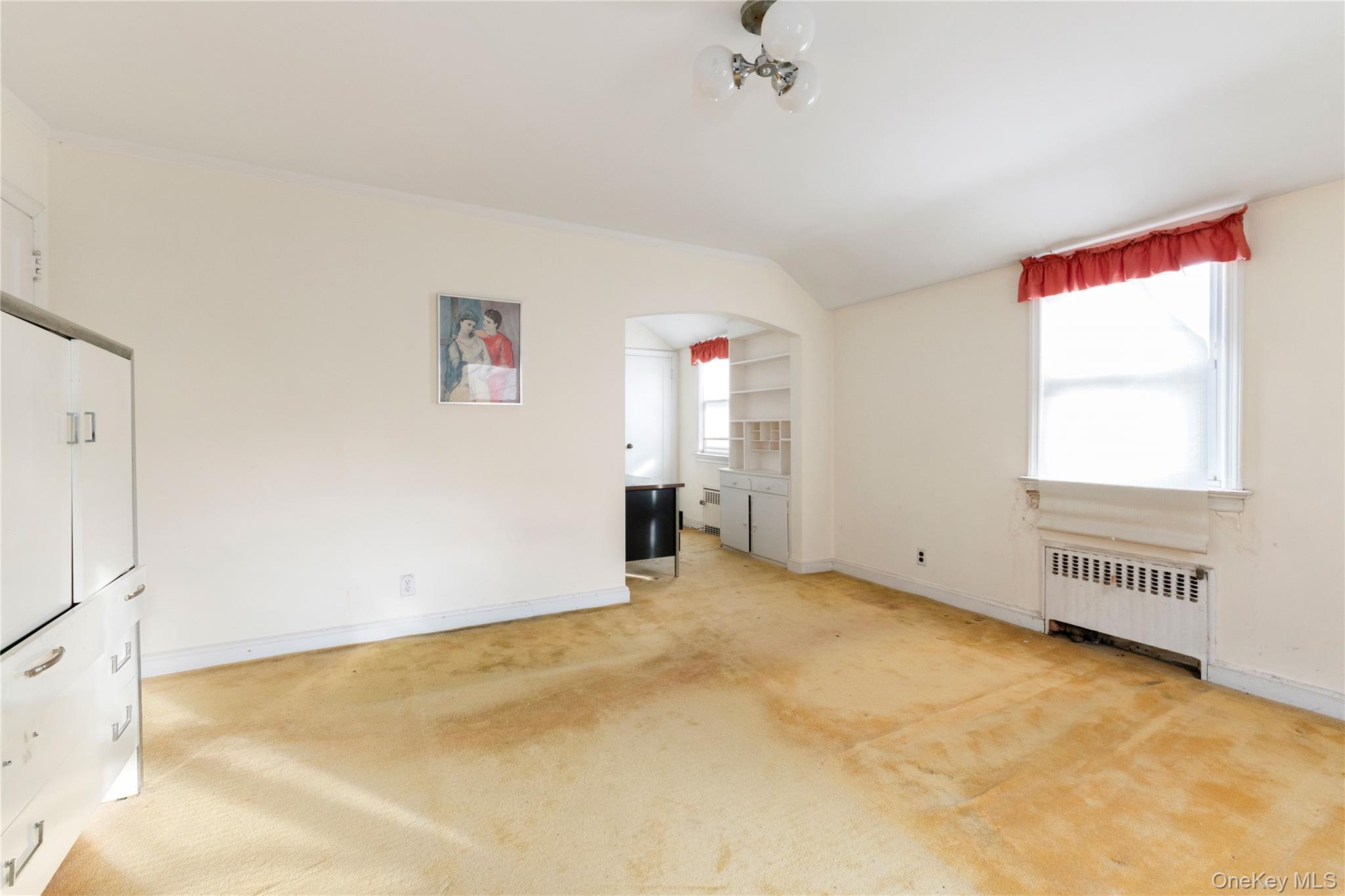 185-47 80th Road Queens, NY 11366 - Photo 13 of 20 a view of an empty room with a window