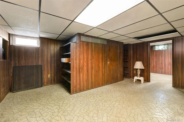 a view of a livingroom with furniture and a garage