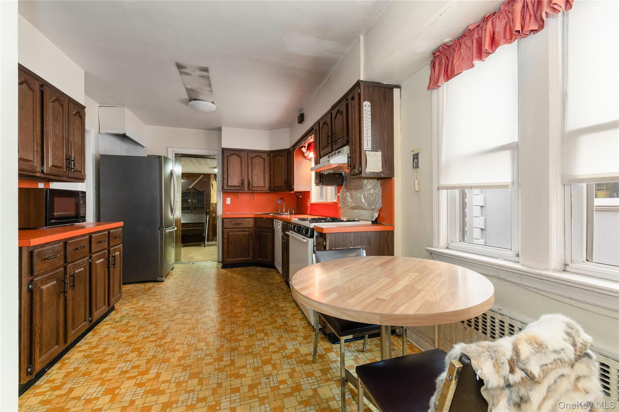185-47 80th Road Queens, NY 11366 - Photo 6 of 20 a kitchen with stainless steel appliances kitchen island granite countertop a sink and cabinets