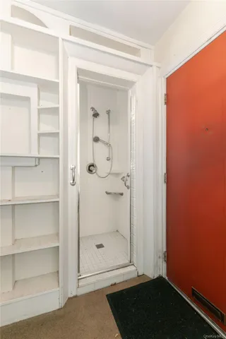 a view of a bathroom with a small space