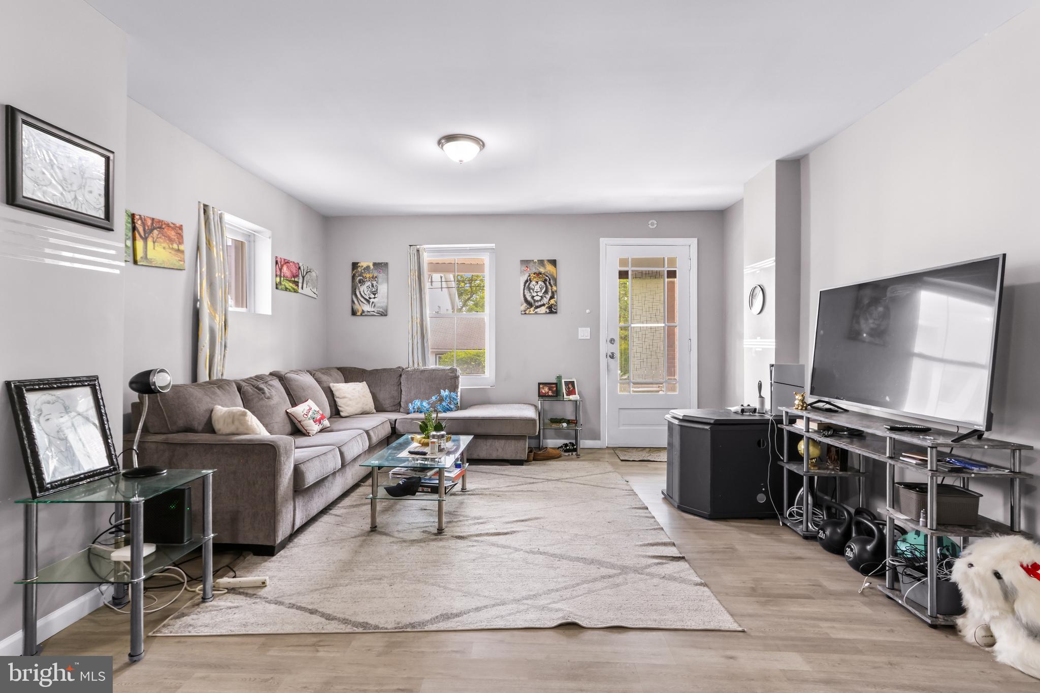 12 South Front Street Coplay, PA 18037 - Photo 5 of 42 a living room with furniture and a flat screen tv