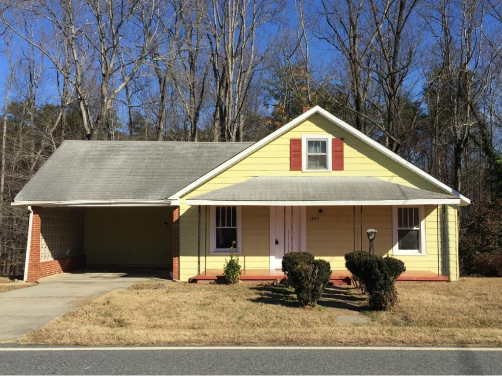 1333 Hampton Road Eden, NC 27288 - Photo 1 of 23 a front view of a house with a yard